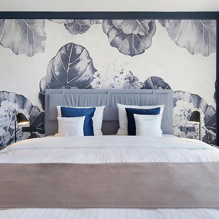 Das ทีแกร์นซี ภายนอก รูปภาพ A bedroom at the hotel