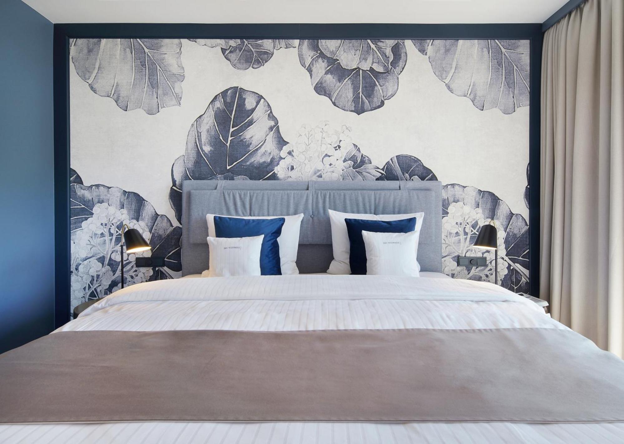 Das ทีแกร์นซี ภายนอก รูปภาพ A bedroom at the hotel