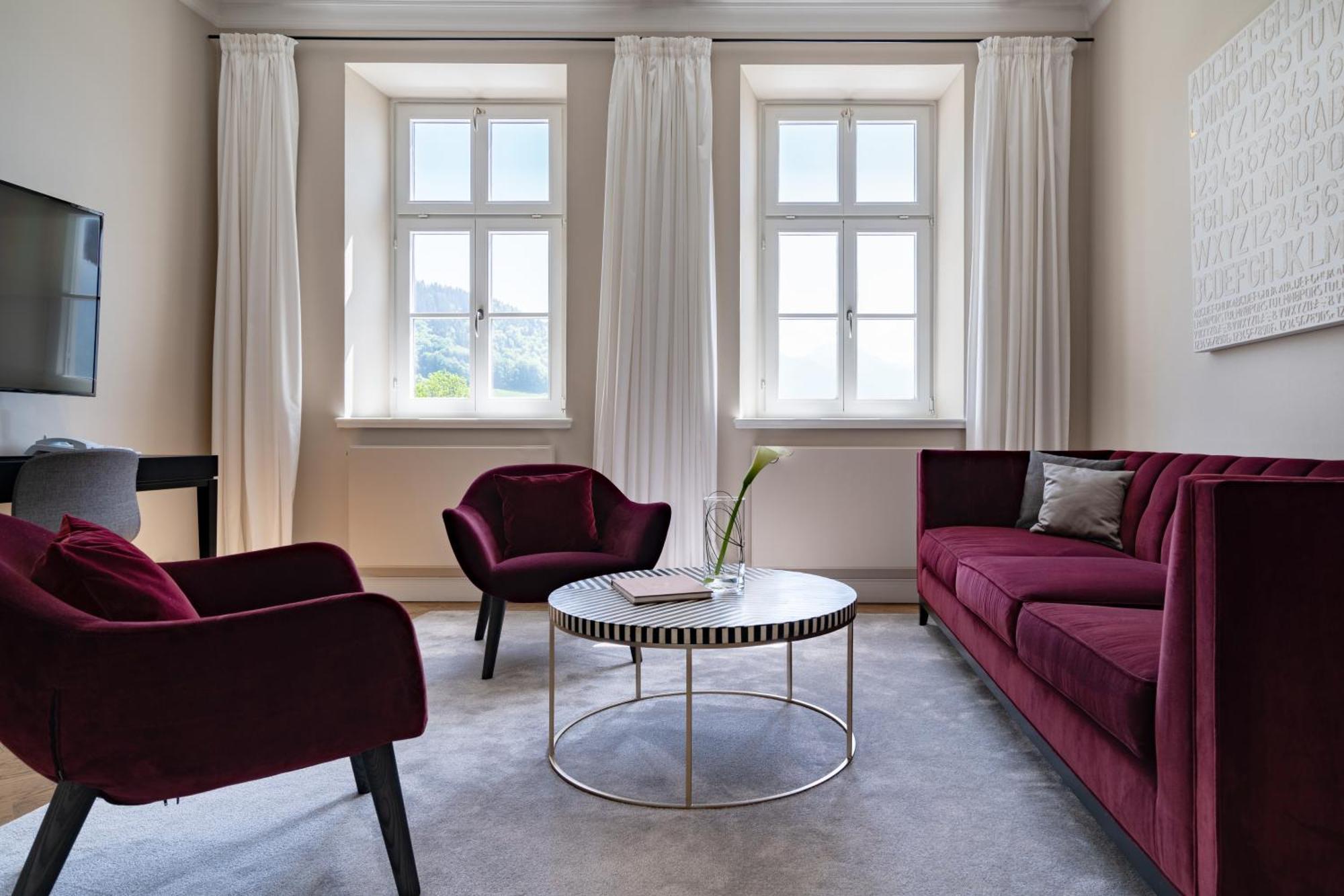 Das ทีแกร์นซี ภายนอก รูปภาพ A living room at the Hotel de la Paix